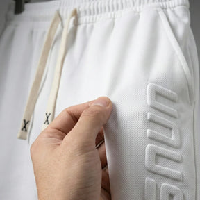 [Leve 4, Pague 2] Bermuda Alpha Masculina em Poliéster Microperfurado e Malha Respirável com Logo Lateral em Relevo 3D + BRINDES